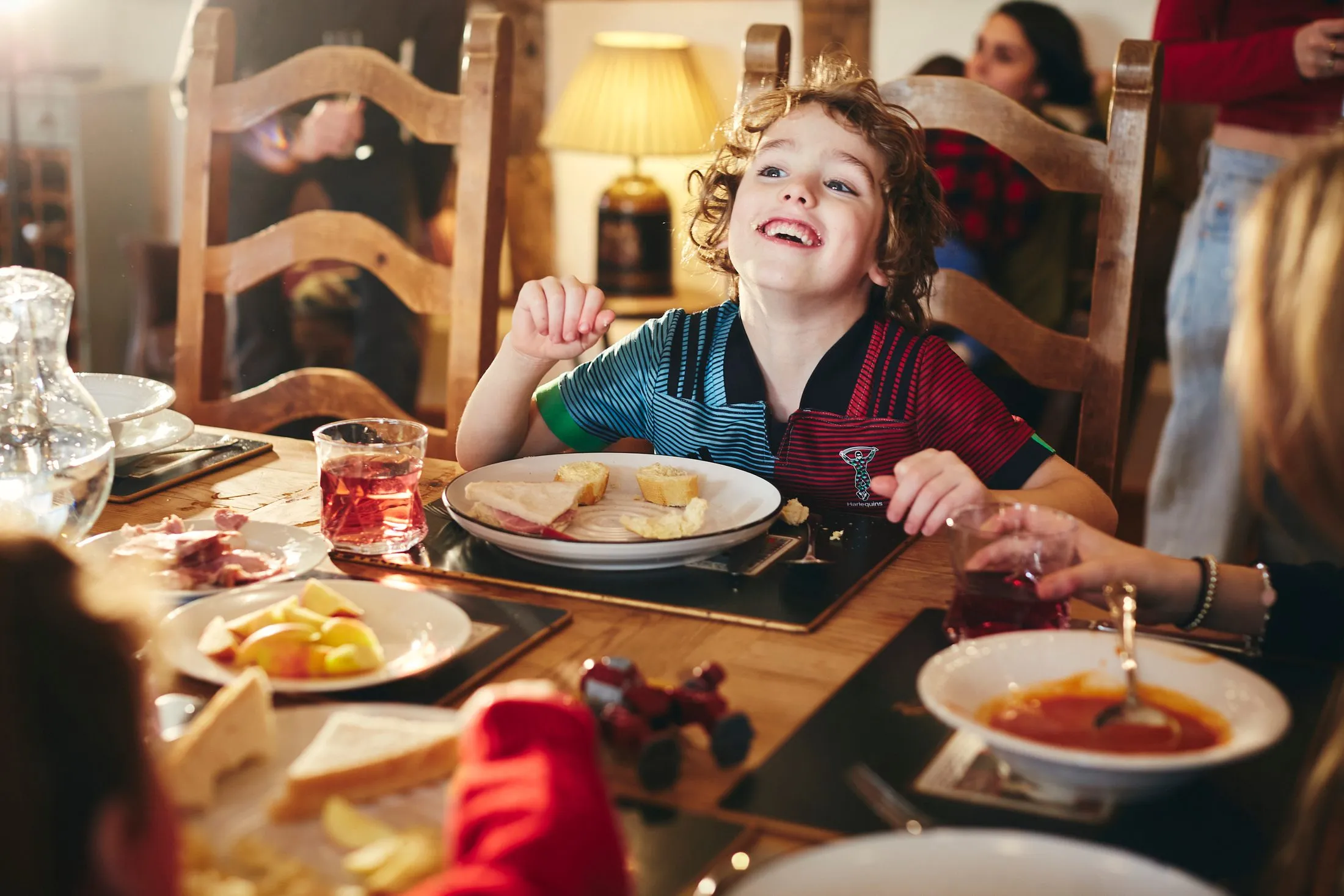 Child Eating Sandwiches Family Kitchen
