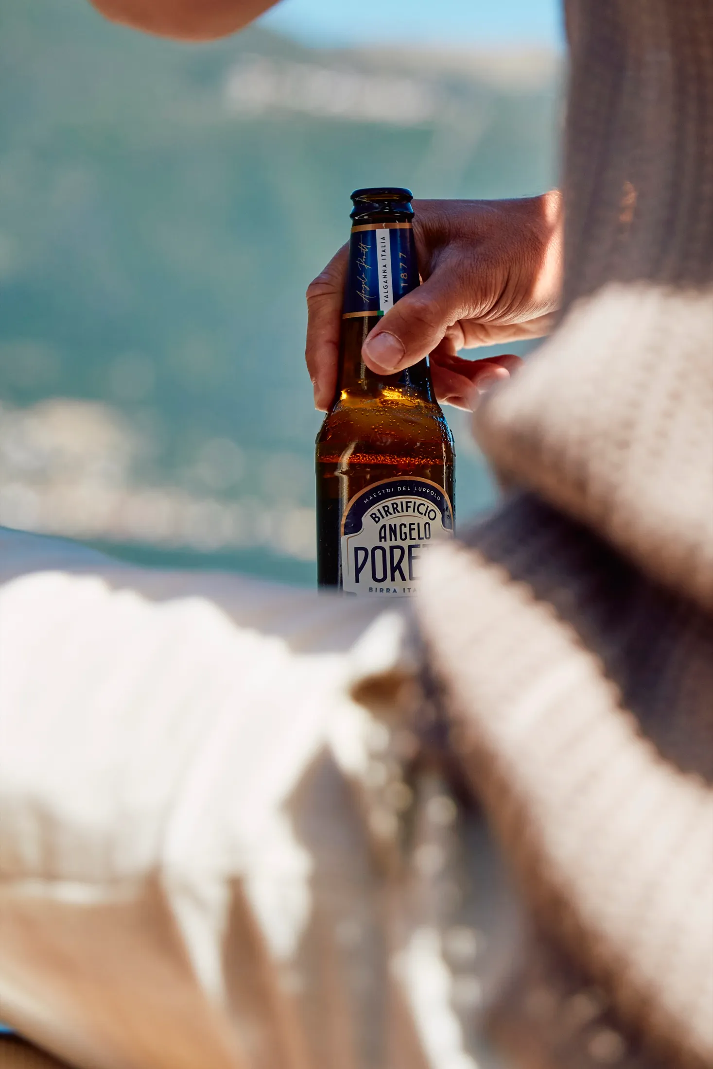 Drinking Beer Hand Poretti
