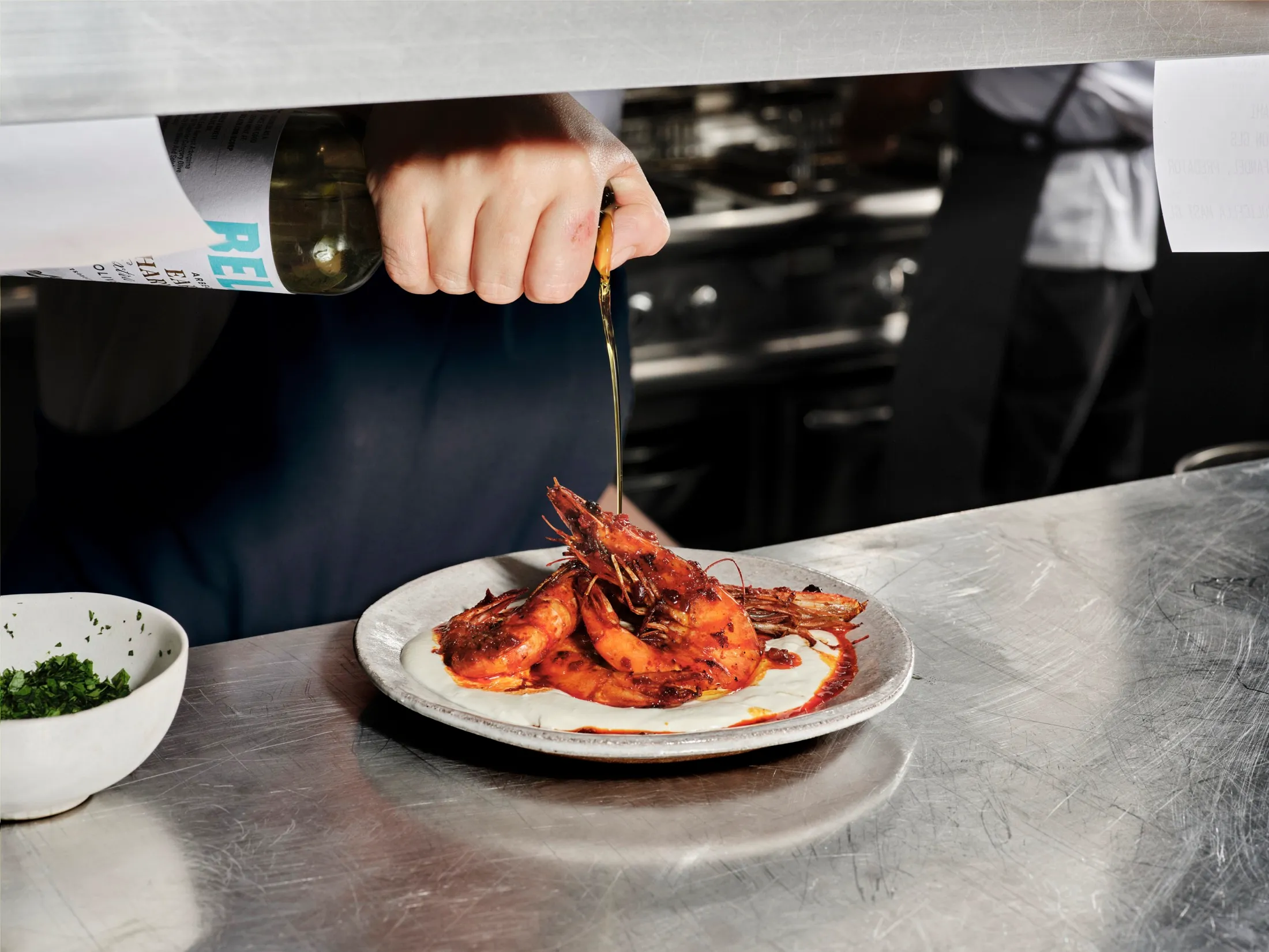 Pouring Oliveoil Prawns Belazu